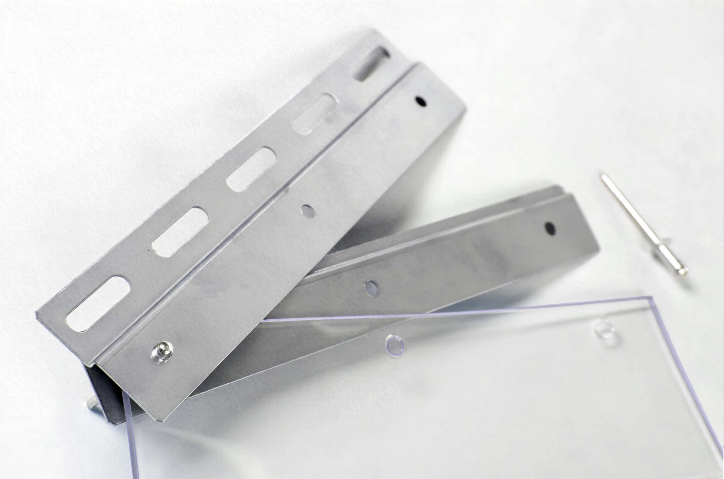PVC Strip and plates being assembled and showing how the plates are assembled before hanging