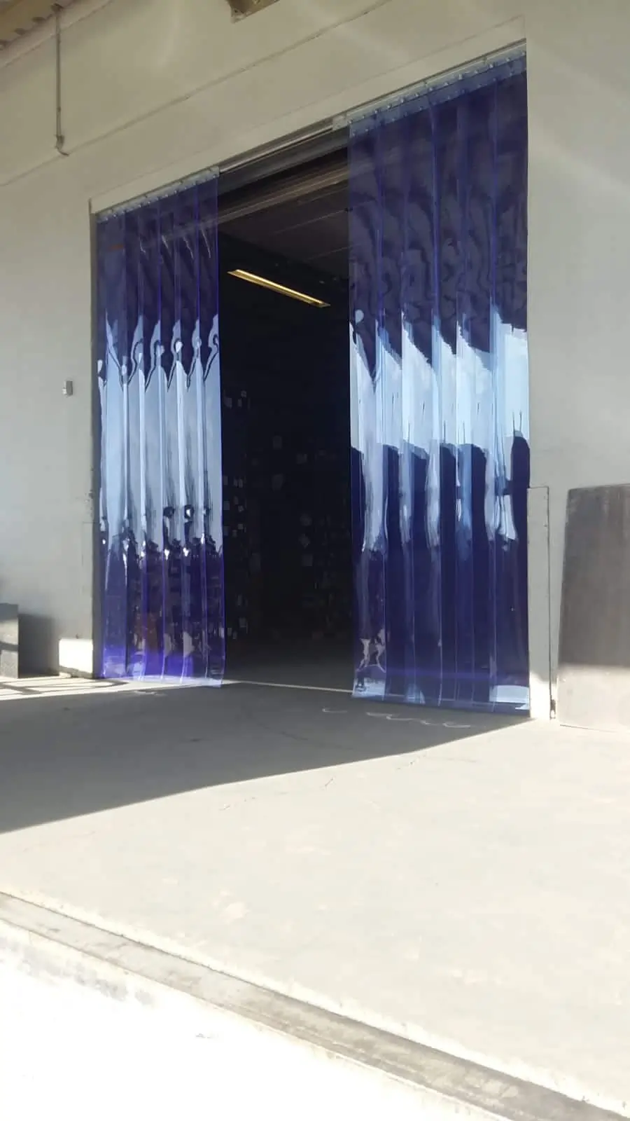 Clearway PVC strip curtains in a warehouse doorway