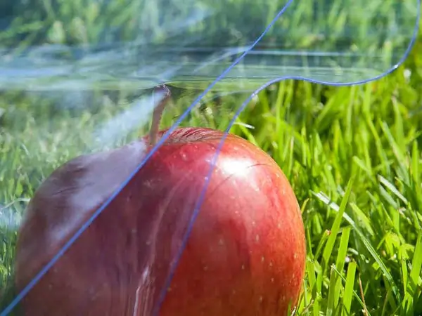 Food grade PVC with an apple on some green grass