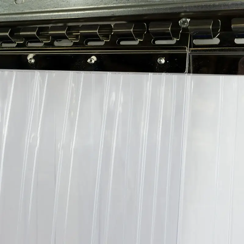 Plastic Ribbed PVC strip curtains hung on plates and rails shown up close