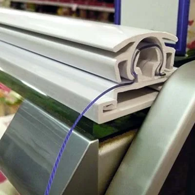 Sheet Chiller Blind in a retail grocery shop fridge door